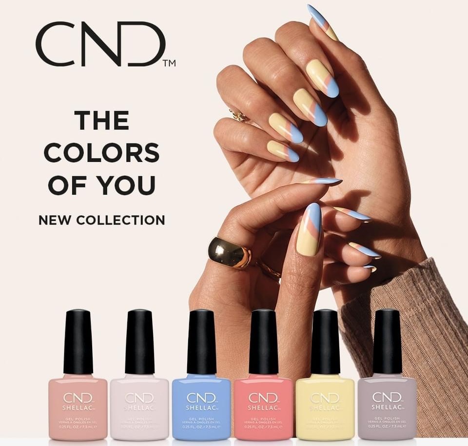 Ungdommelige hænder viser en palette af pastelfarvede CND-neglelakker fra 'The Colors of You' kollektionen, ideel til konfirmationspakker og skønhedsbehandlinger for unge.